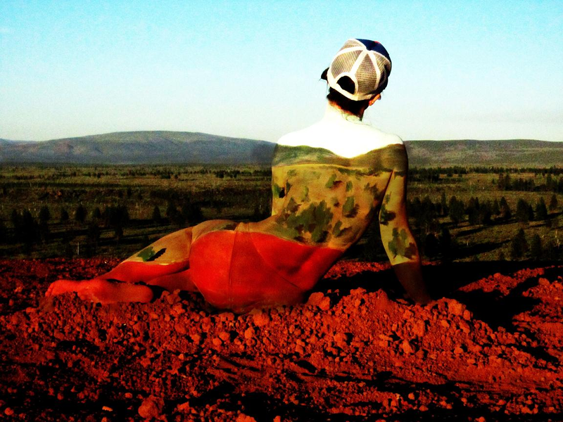 Illustration for article titled People turn invisible in these awesome body paint photographs (NSFW)